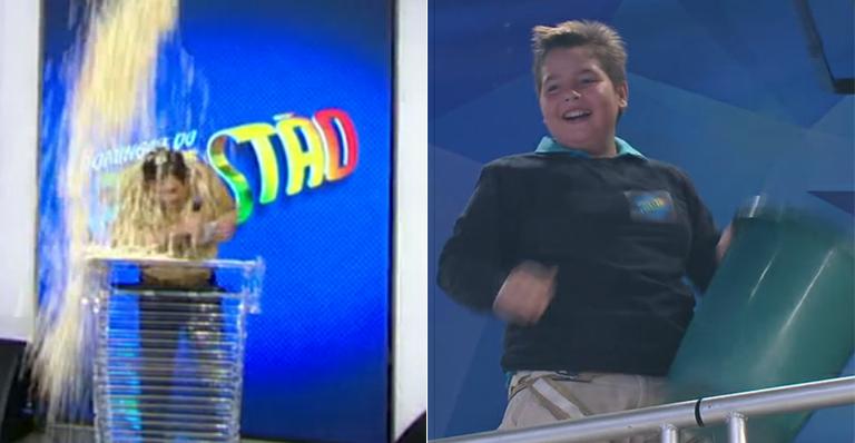 Filho de Faustão joga balde de pipoca no pai durante programa ao vivo
