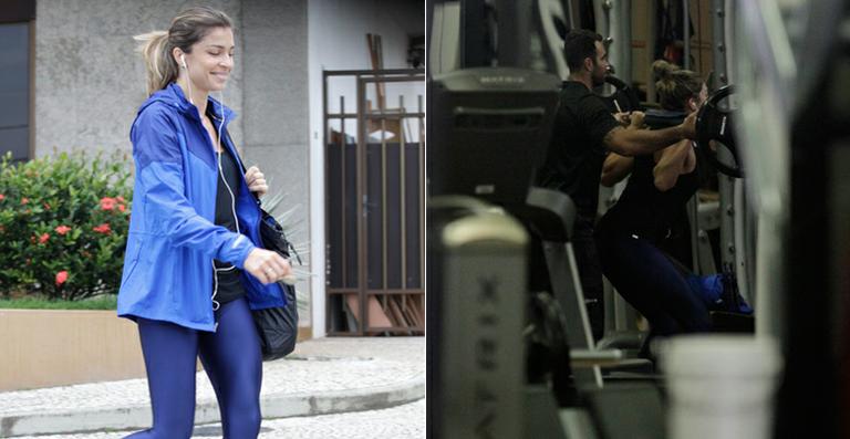 Sorridente, Grazi Massafera malha em academia no Rio