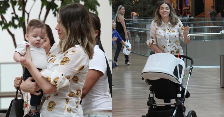Luma Costa passeia com Antônio, seu filho de 5 meses, em shopping no Rio