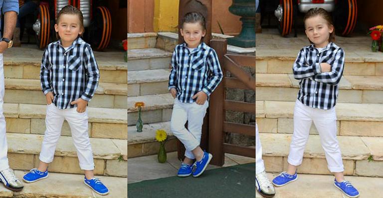 Pietro, filho de Otávio Mesquita, brinca de modelo no Kids Fashion Show