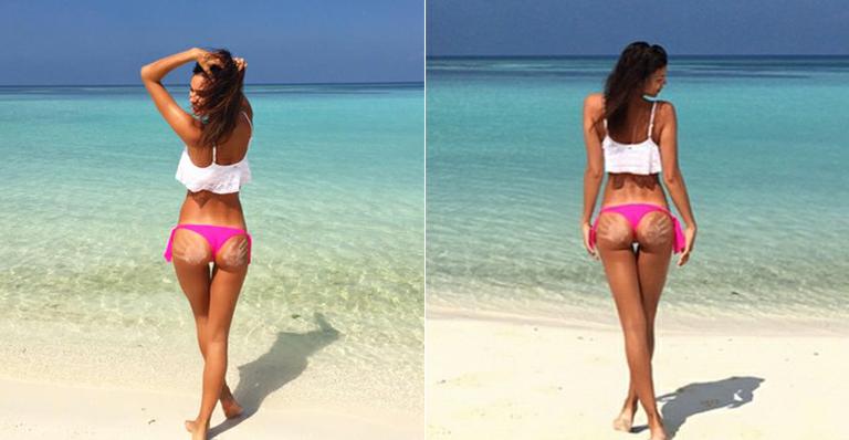 Irina Shayk exibe marcas de mãos no bumbum em fotos na praia