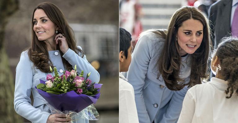 Com conjunto clássico, Kate Middleton diz que já sente bebê chutar