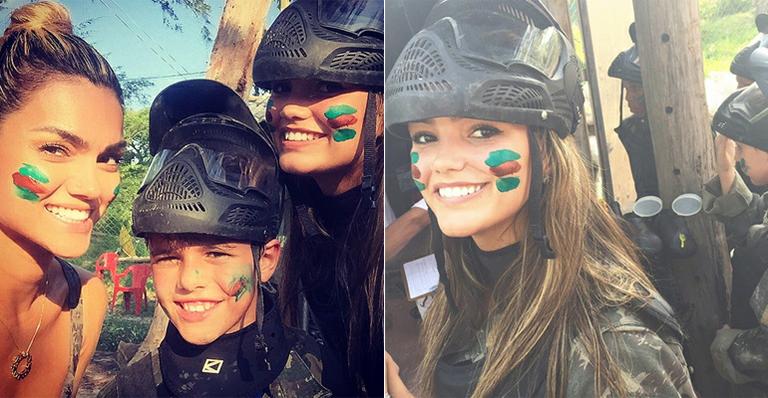 Longe da folia: Kelly Key se diverte em paintball com os filhos