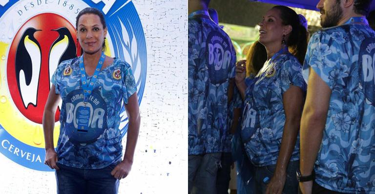 Grávida, Carolina Ferraz mostra o barrigão no carnaval