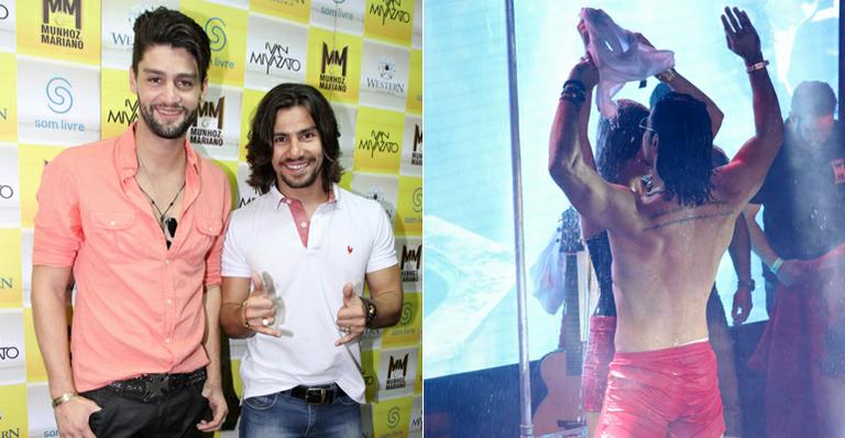 Mariano se empolga e toma banho com fã no palco