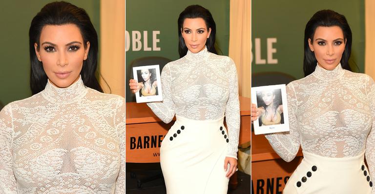 Kim Kardashian aparece sem sutiã em lançamento do seu livro