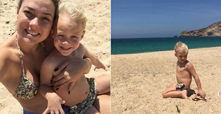 Carol Dantas e Davi Lucca curtem praia em Portugal