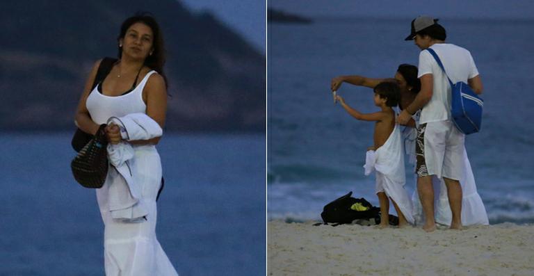 Grávida pela 2ª vez, Dira Paes curte praia em família