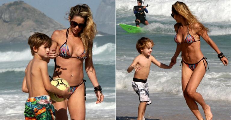 Danielle Winits: diversão com os filhos na praia
