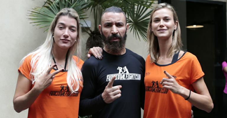 Musas Gabriela Pugliesi e Renata Kuerten em evento fitness