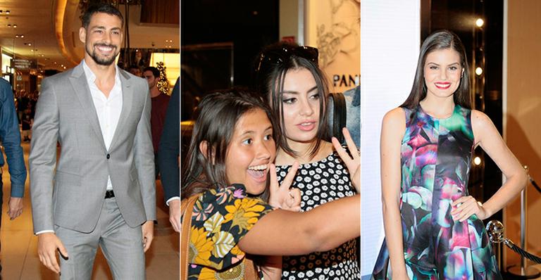 Cauã Reymond, Camila Queiroz e britânica Charli XCX são tietados em evento de grife italiana