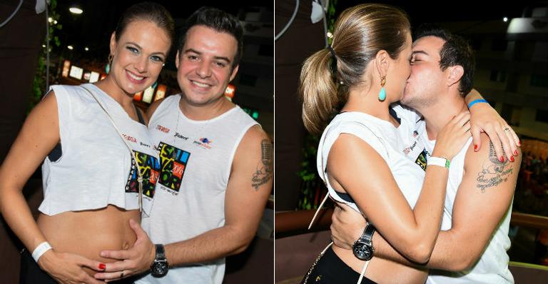 À espera do primeiro filho, Thais Pacholek e Bruno Belutti trocam beijos no carnaval