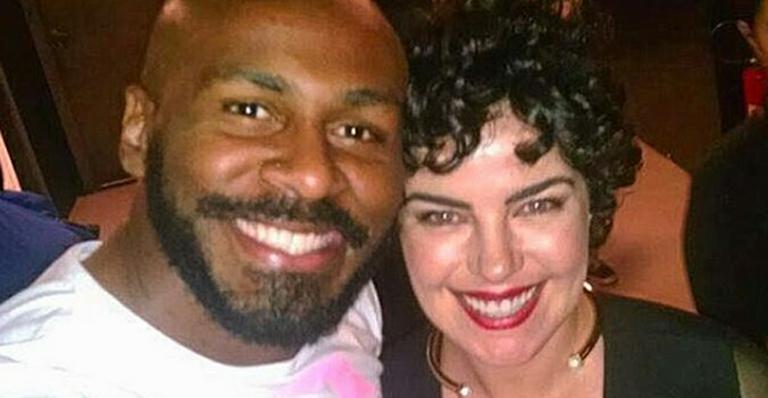 Ana Paula Arósio reaparece em foto com amigo da escola