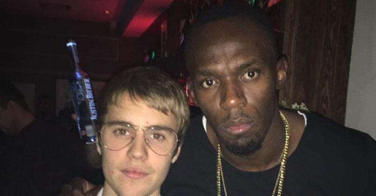 Justin Bieber e Usain Bolt curtem balada juntos em Londres