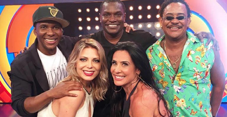 Integrantes do É O Tchan se reencontram na TV