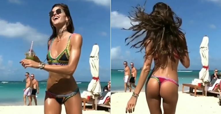 Beleza de Izabel Goulart atrai olhares em praia de St. Barth
