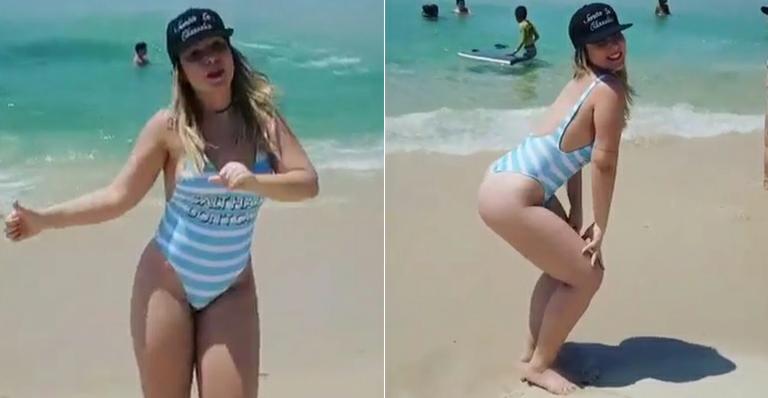 De maiô cavado, Cacau dança funk na praia e diz: “Não sou bailarina, muito menos musa fitness”