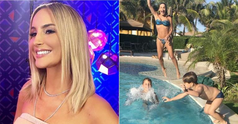 Claudia Leitte exibe a barriga trincada ao brincar na piscina com os filhos