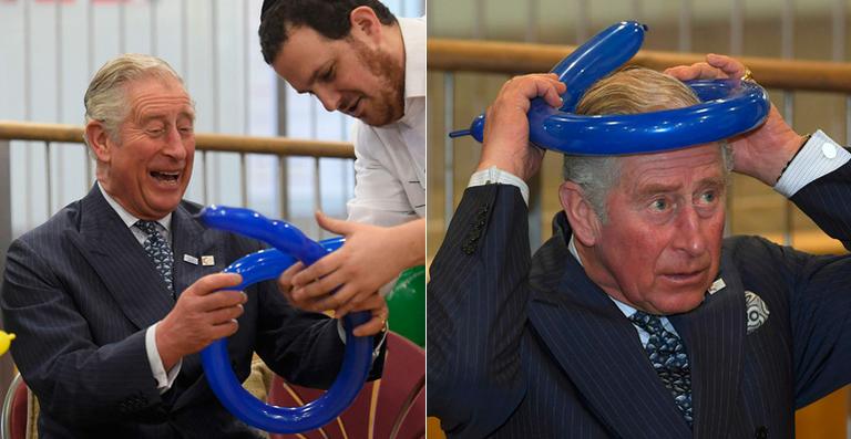 Príncipe Charles usa ‘coroa’ de balão em encontro com crianças