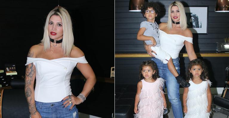 Dani Souza leva os filhos para evento em SP
