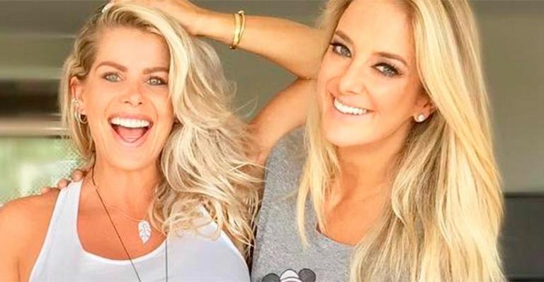 Gravidíssima, Karina Bacchi ganha beijo de Rafa Justus no barrigão