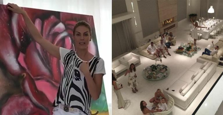 Ana Hickmann sobe em andaime para instalar quadros em sua sala gigantesca