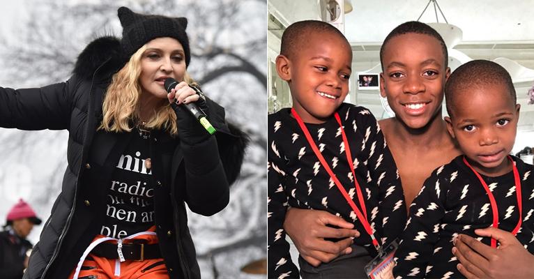 Gêmeas caçulas de Madonna divertem fãs da cantora ao pularem sem parar em dança ao lado do irmão