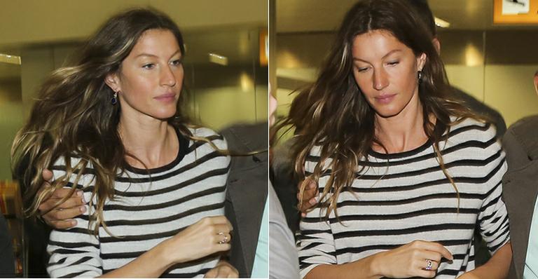 Em rara aparição sem maquiagem, Gisele Bündchen desembarca em São Paulo