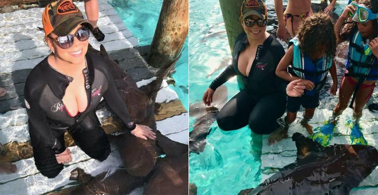 Mariah Carey leva os filhos para mergulho com tubarões