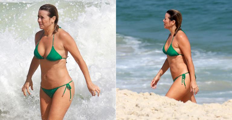 Christine Fernandes exibe boa forma em tarde na praia