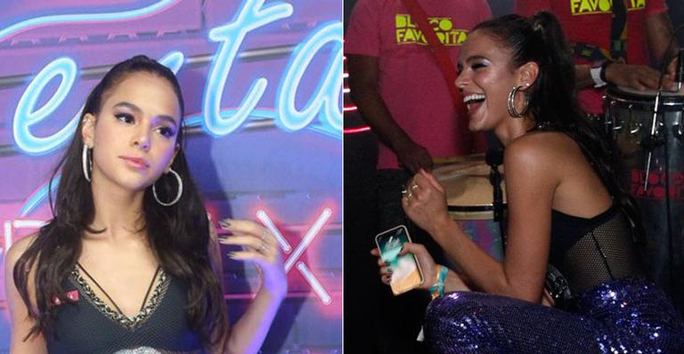 Bruna Marquezine chega tímida, mas vai até o chão em camarote na Sapucaí