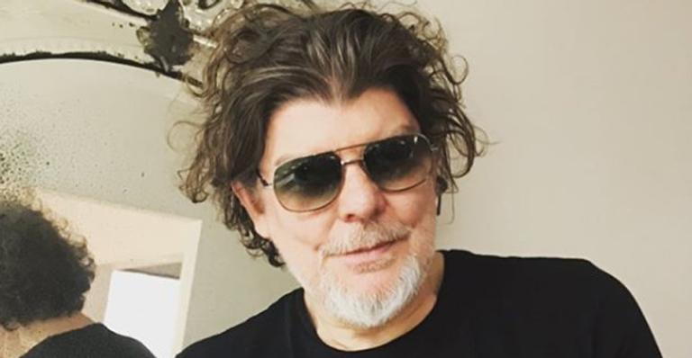 Tratando um tumor na laringe, Branco Mello posa com Oscar Schmidt e tranquiliza fãs