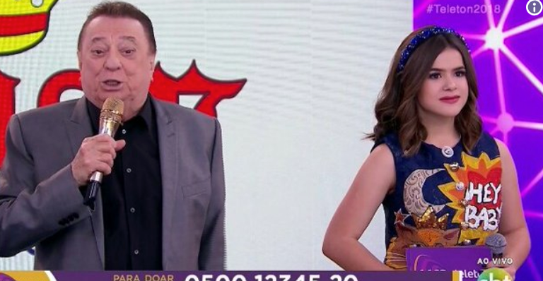 Raul Gil tenta elogiar Jair Messias Bolsonaro, é tesourado por Maisa Silva e gera climão no Teleton