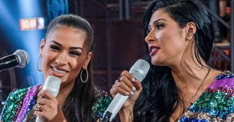 Simone e Simaria surgem minúsculas ao lado de Leo Santana e divertem a web