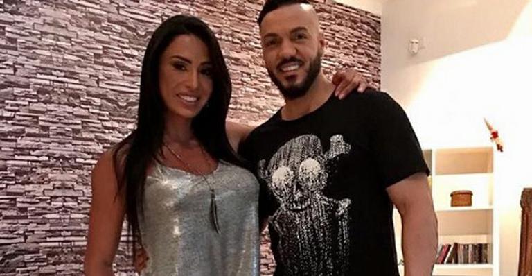 Após causarem tumulto, Gracyanne Barbosa e Belo dão beijaço em São Paulo