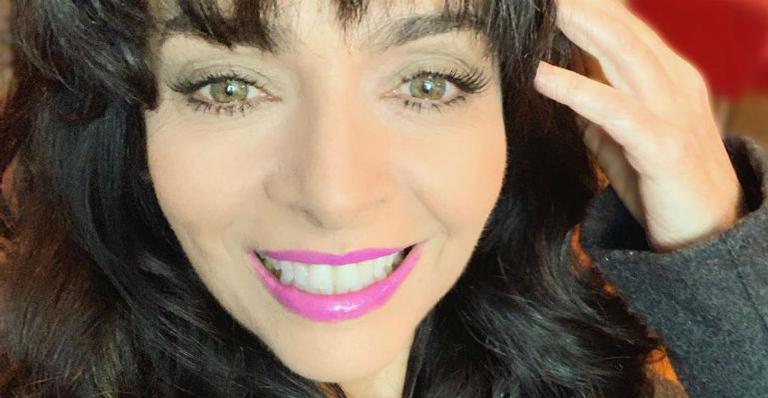 Claudia Ohana é flagrada em passeio com o novo namorado
