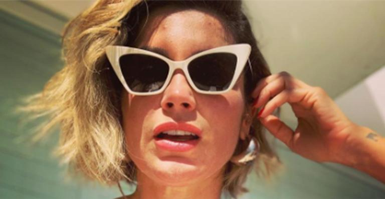 Flávia Alessandra empina o bumbum de maiô fio dental e provoca: ”Não vale dar zoom”