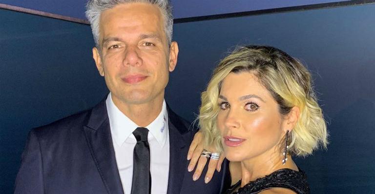 Após férias, Flávia Alessandra curte Rock in Rio na companhia de Otaviano Costa