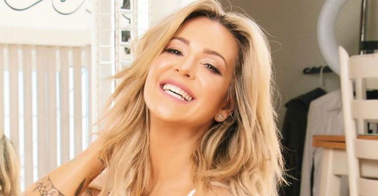 Ana Paula Saad exibe barrigão da terceira gravidez