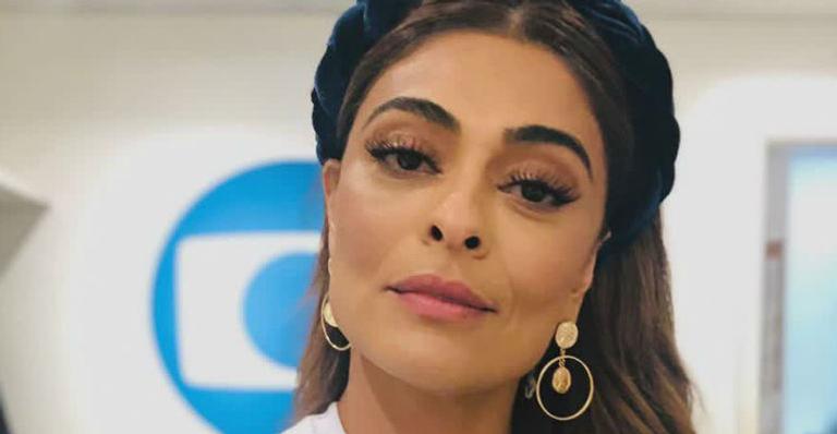 Juliana Paes aparece dando um beijo na bochecha do marido, Dudu Baptista e brinca: ”Ô lá em casa”