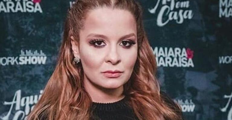 Maiara surge renovando o bronzeado com maiô cavado e ostenta corpaço