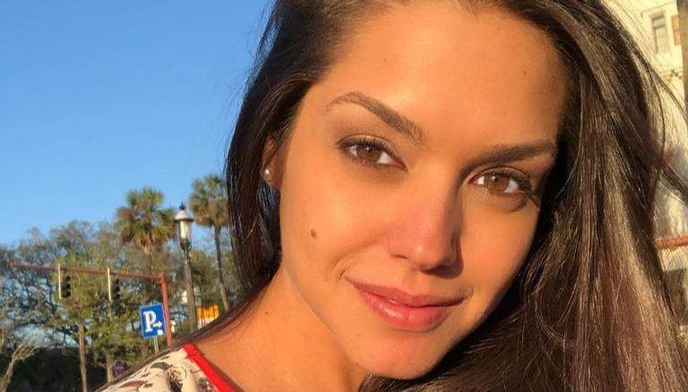 Thais Fersoza faz stand up paddle de vestido longo e explica: ”A saudade estava grande”