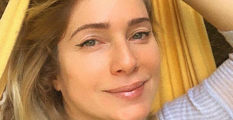 Com o namorado, Leticia Spiller esbanja paixão em cachoeira
