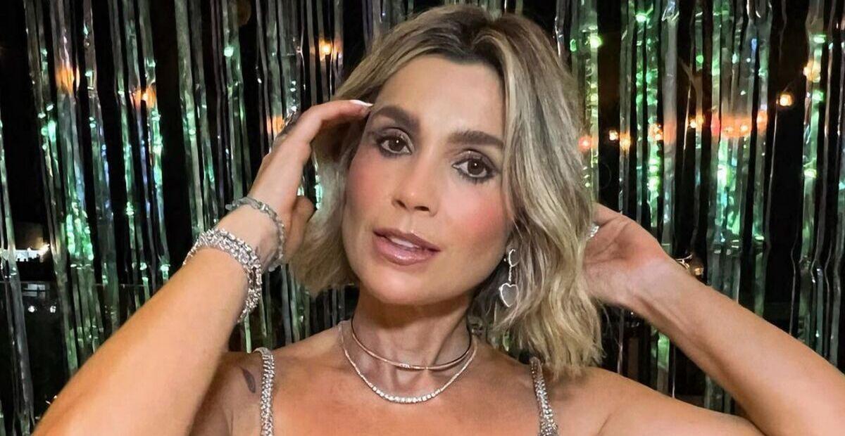 De vestido micro brilhante, Flávia Alessandra rouba a cena em Réveillon com a família